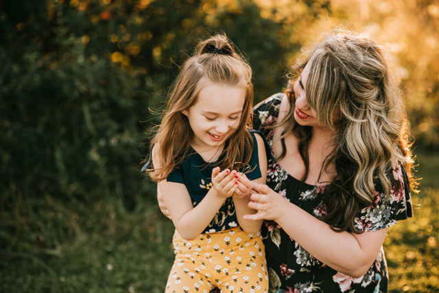 cary family photographer, mother and daughter laughing