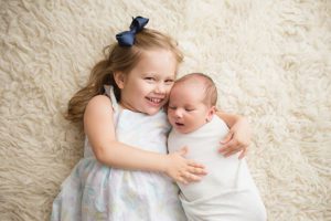 newborn with sibling raleigh