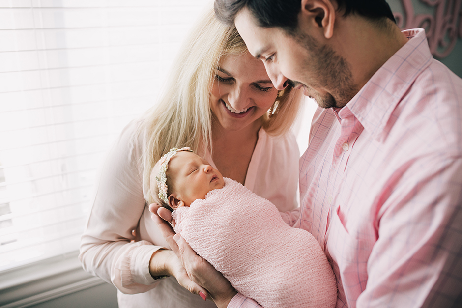 parents with newborn lifestyle newborn photographer raleigh
