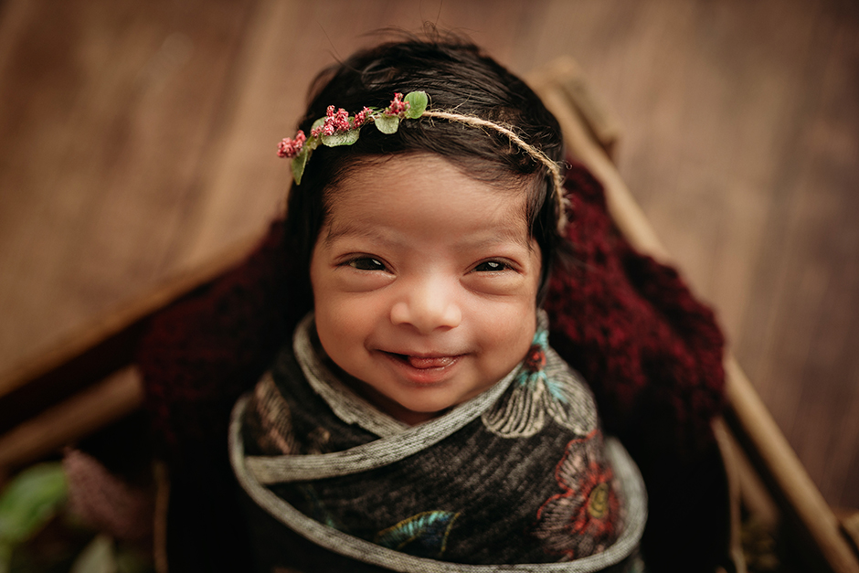 smiling newborn raleigh newborn photographer