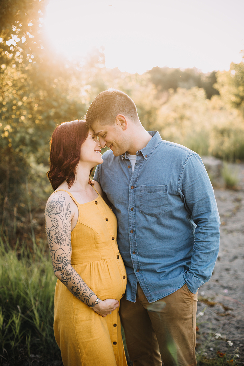 pregnant couple embracing cary maternity photographer