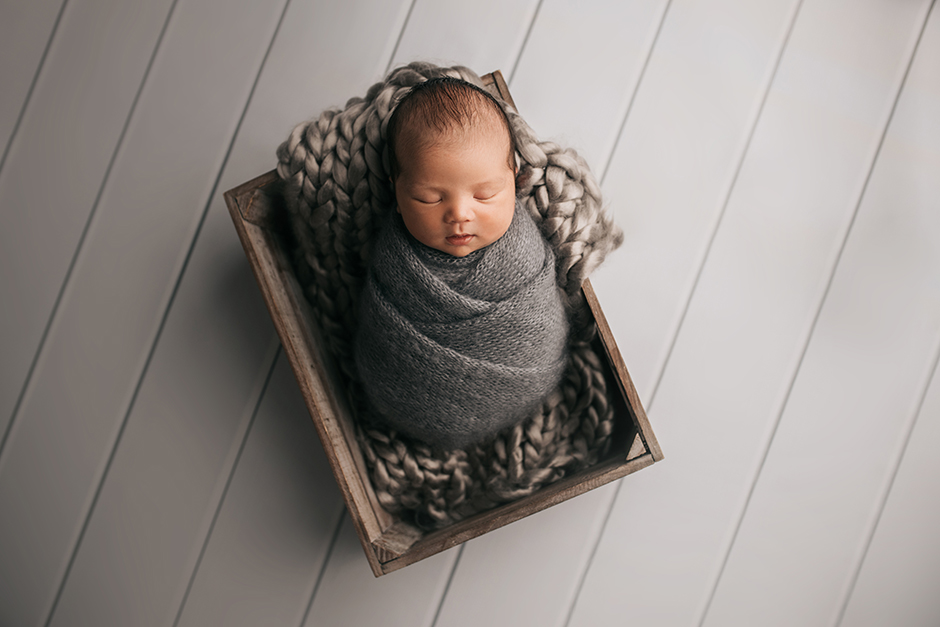 Swaddled newborn baby