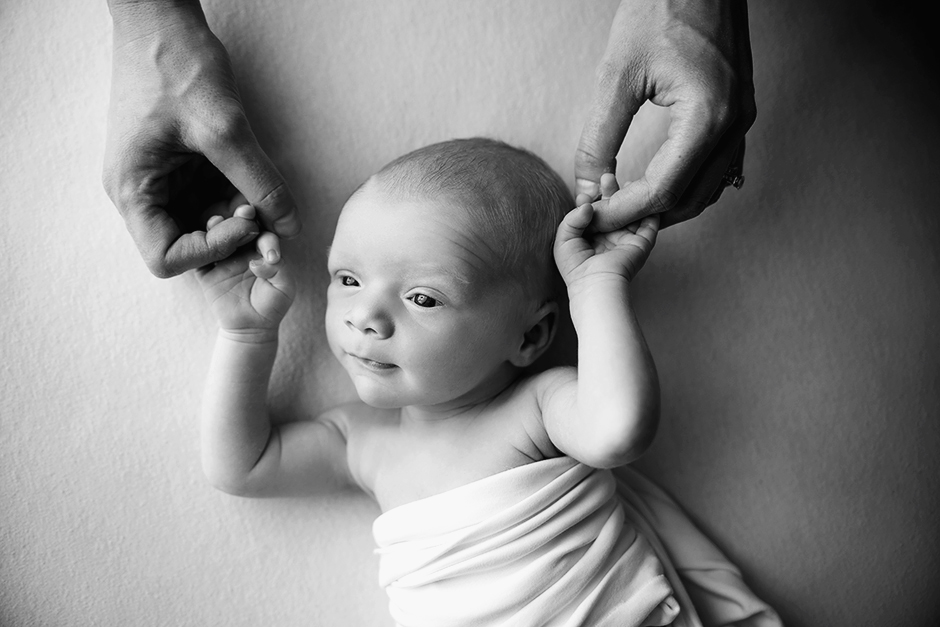 newborn holding mommy's hands, cary natural newborn photographer