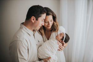 parents with newborn in Cary
