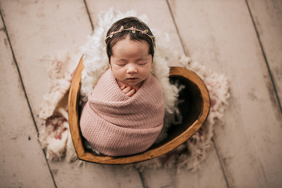 newborn in heart bowl in Cary NC