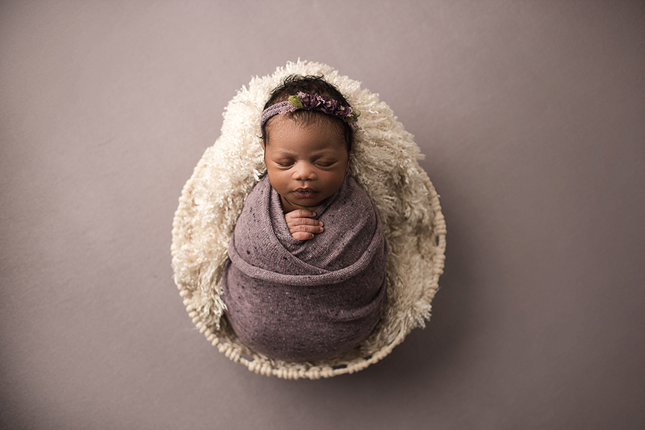 newborn swaddled in purple, newborn photographer raleigh