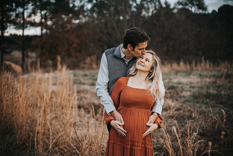 maternity session in raleigh, mom and dad embracing