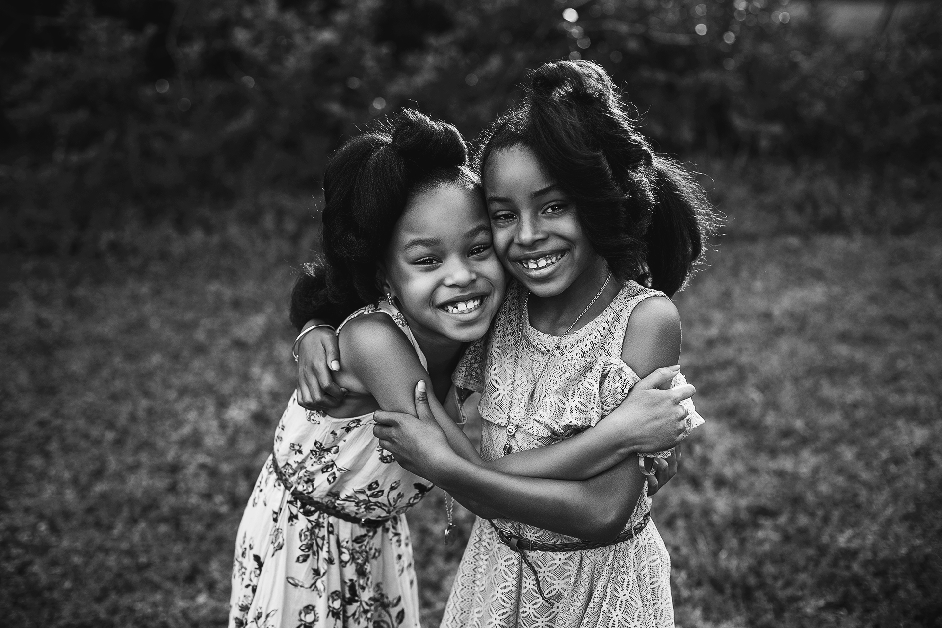 raleigh family photography sisters hugging