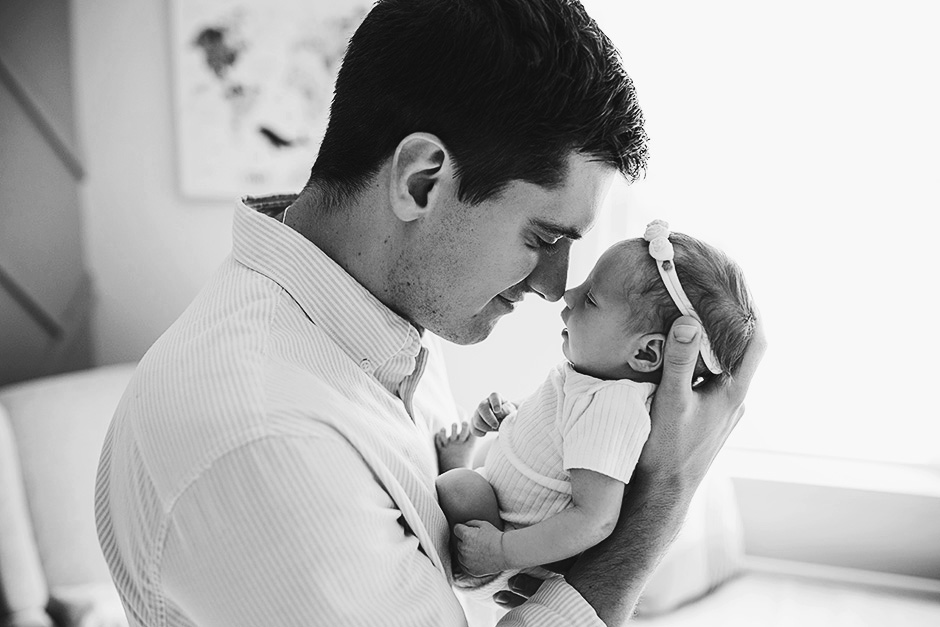 dad and newborn baby touching noses, lifestyle baby photos clayton